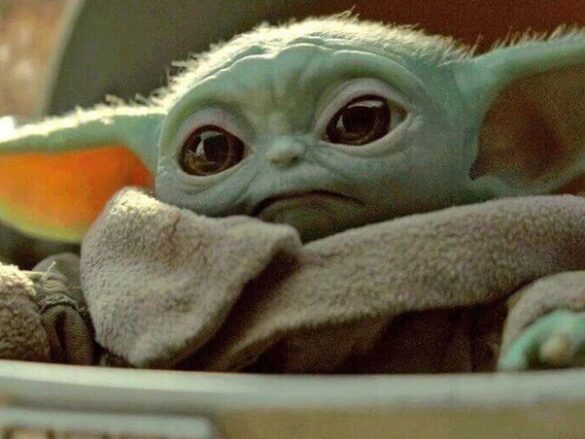 How do you activate the Baby Yoda?